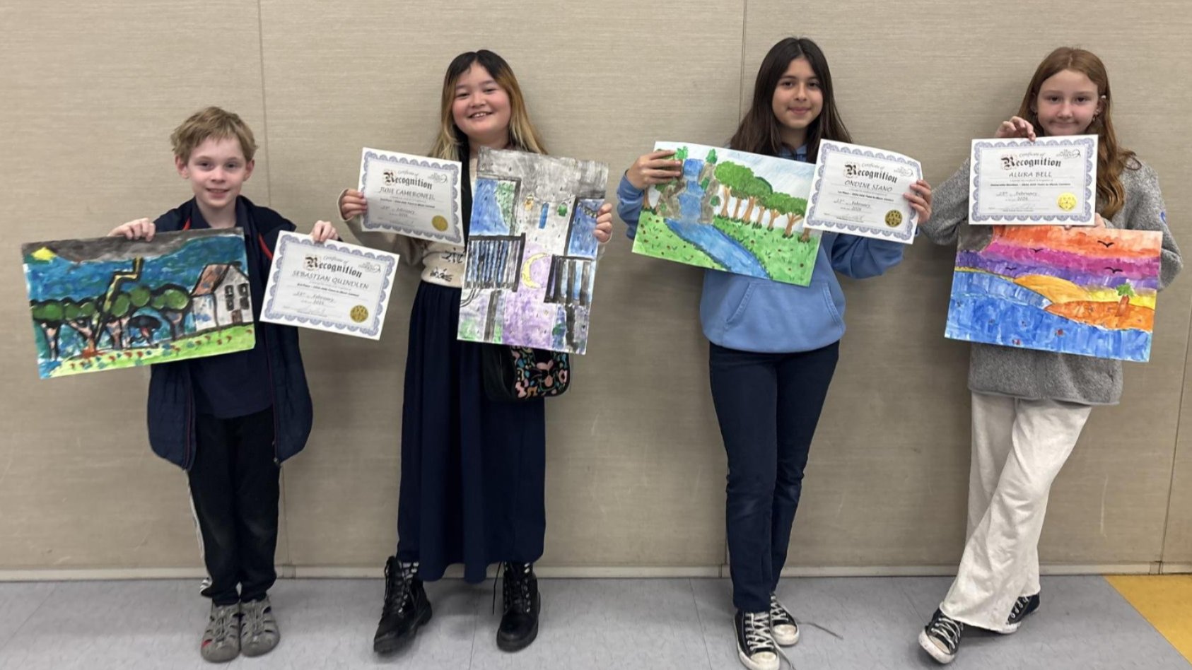 Students with hands in the middle