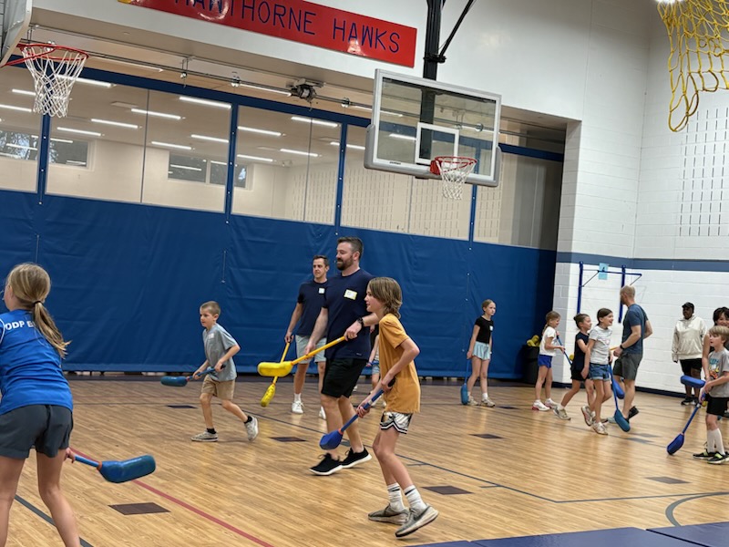 teacher working with student