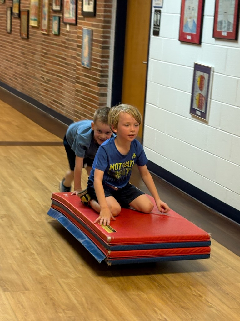 teacher working with student