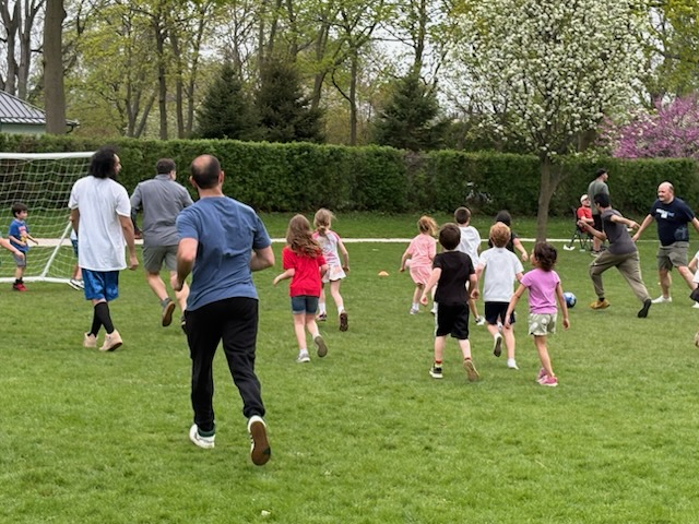 teacher working with student