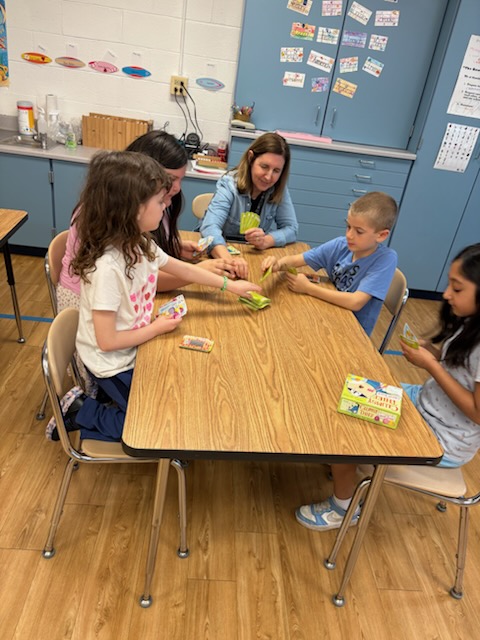 teacher working with student