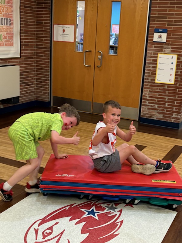 teacher working with student