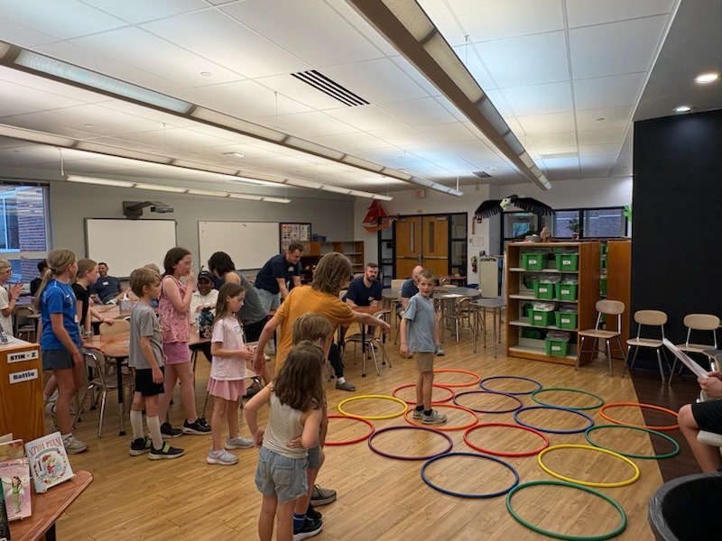 teacher working with student