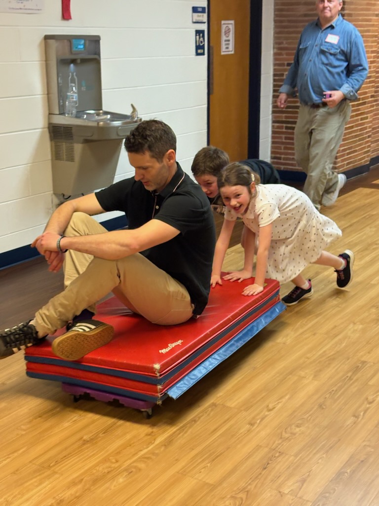 teacher working with student