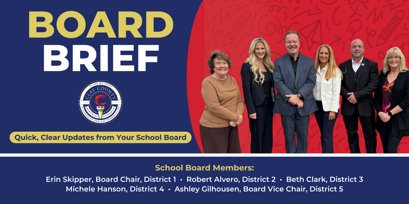 Board Members standing with the superitendent