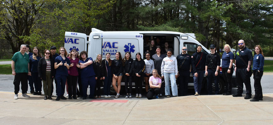 Criminal Justice and Health Science Careers students and teachers and MOVAC workers by ambulance