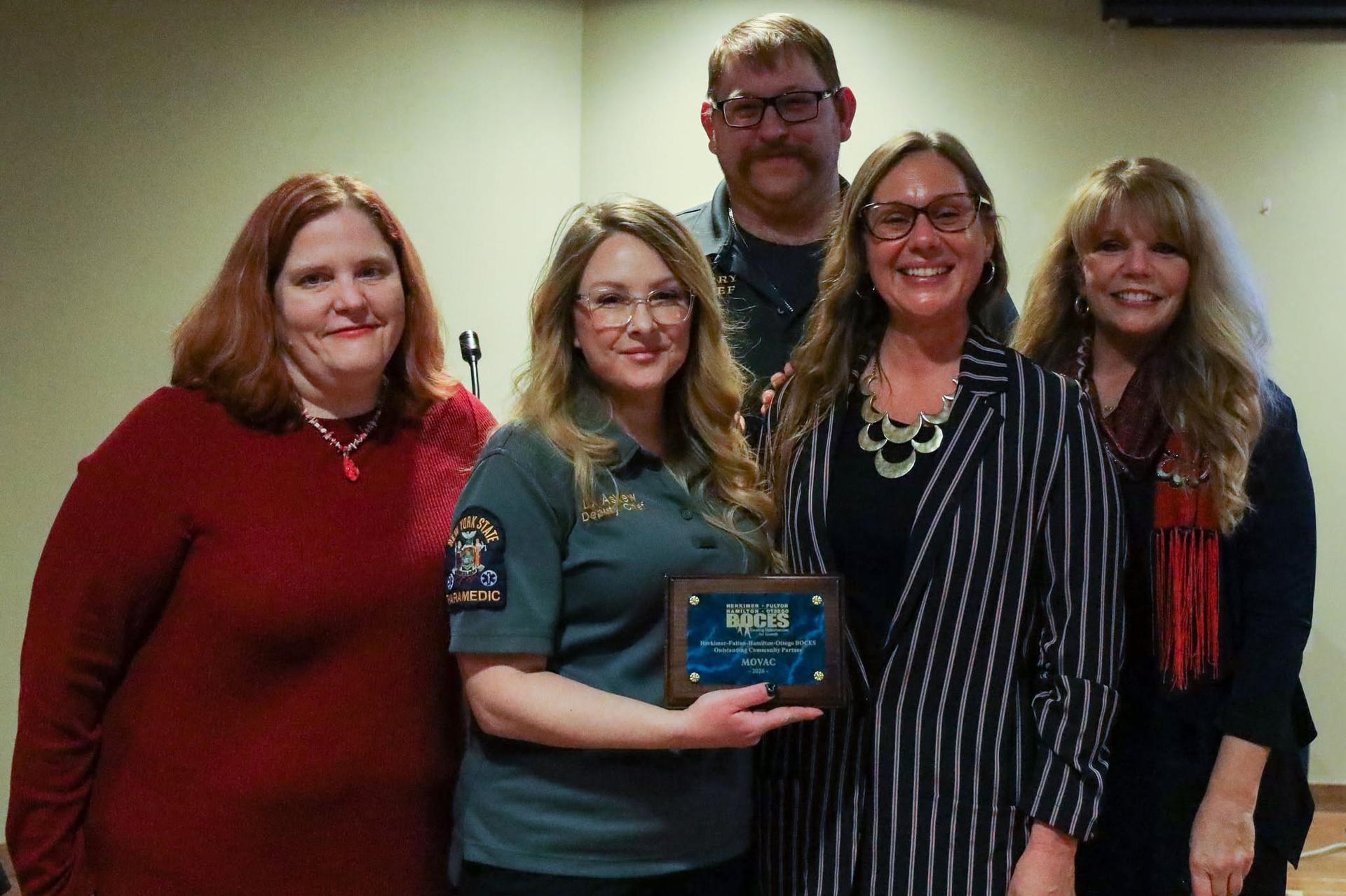 MOVAC and School to Careers staff posing with award