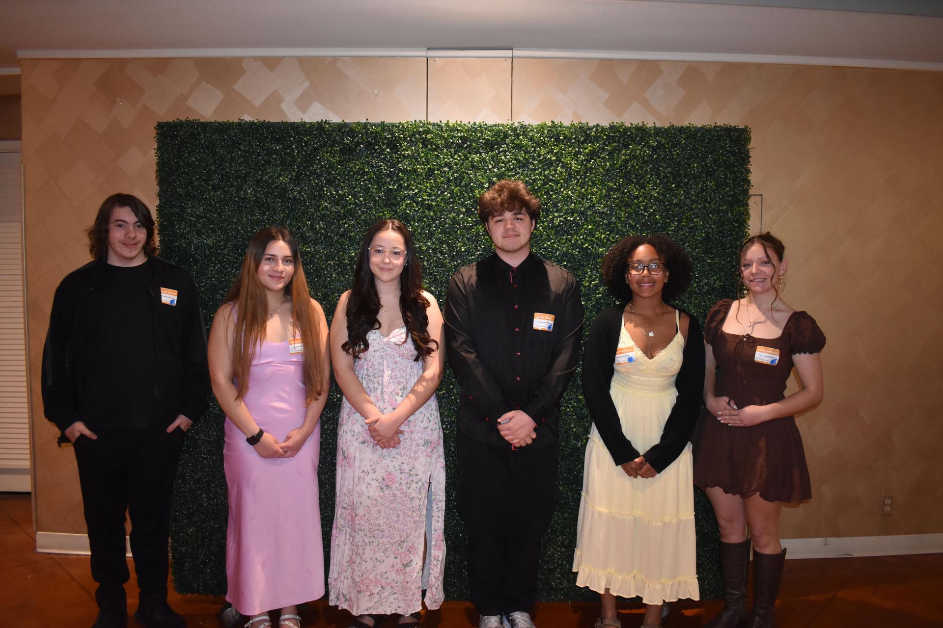 Several students posing together at SBI event