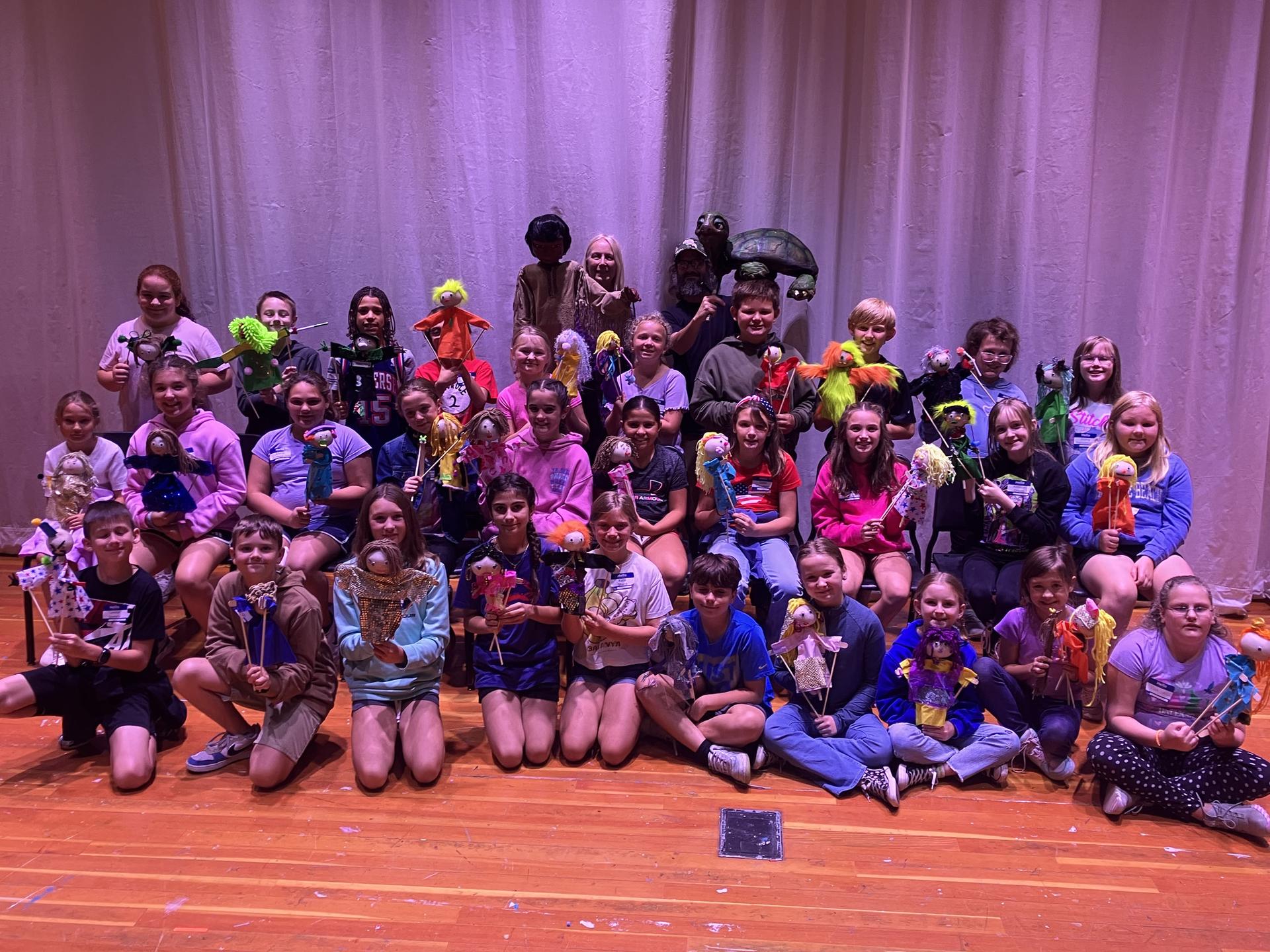 Students and science teacher with space seed capsule and certificate