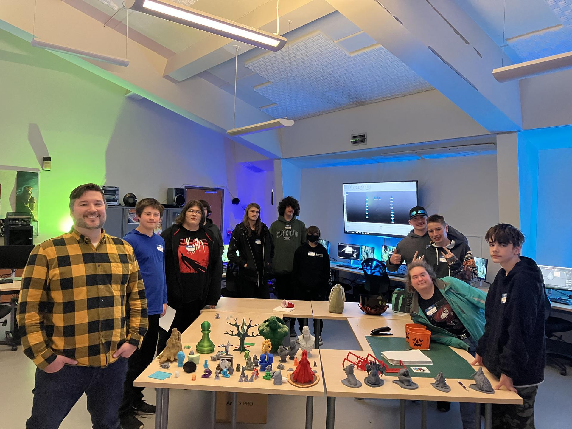 Students and science teacher with space seed capsule and certificate