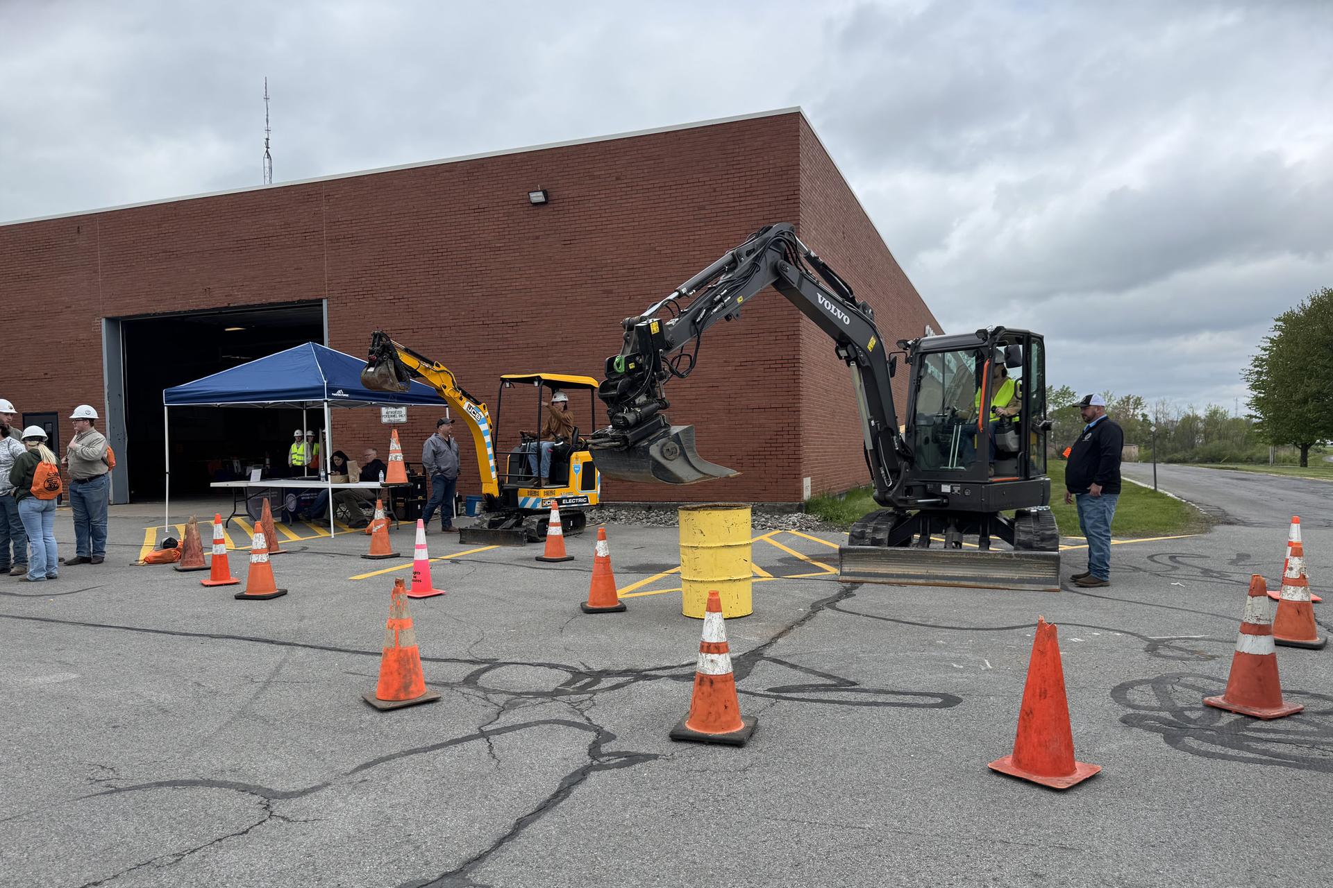 Students operating heavy machinery outside Oneida County DPW
