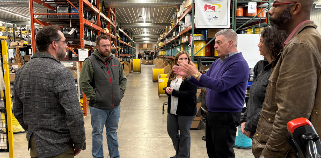Several people speaking at Fiber Instrument Sales/Giotto Enterprises