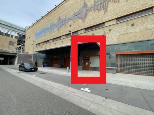 Image of student entrance with door outlined in a red box.