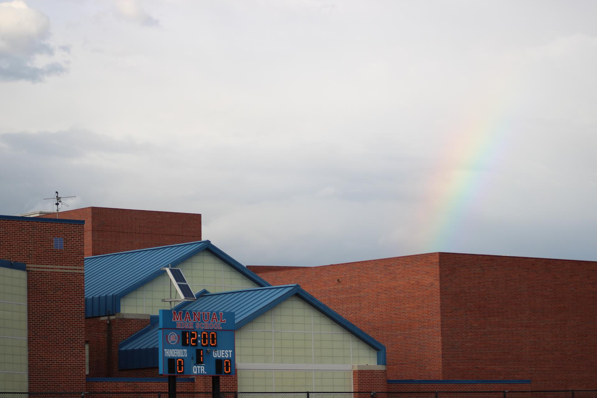 Rainbow over the Manual score board during homecoming