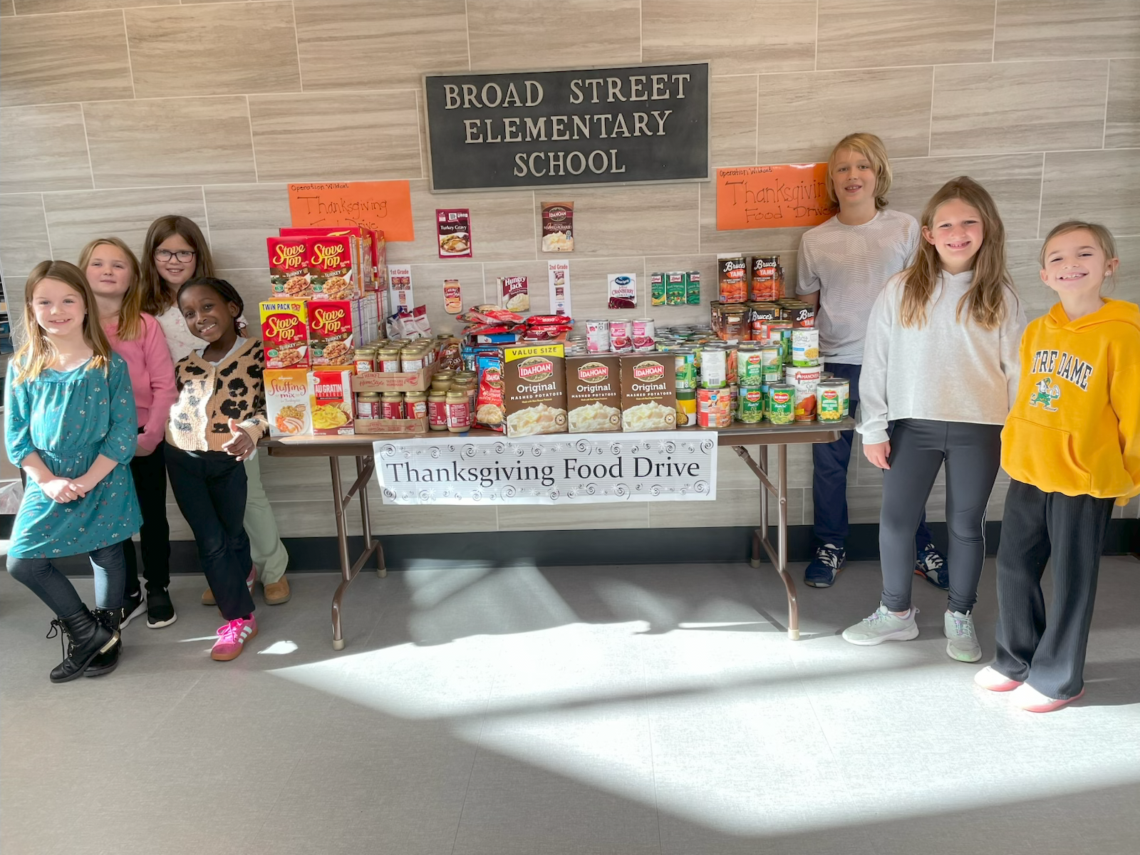 Image of students and thanksgiving food collection