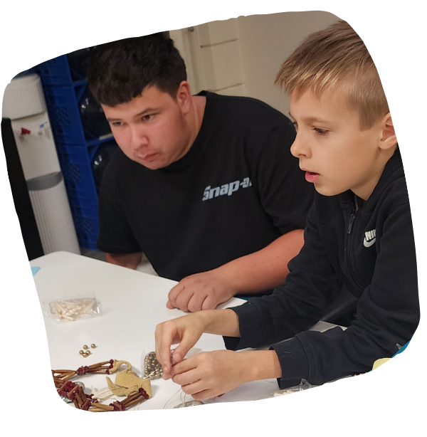 Two students making a craft