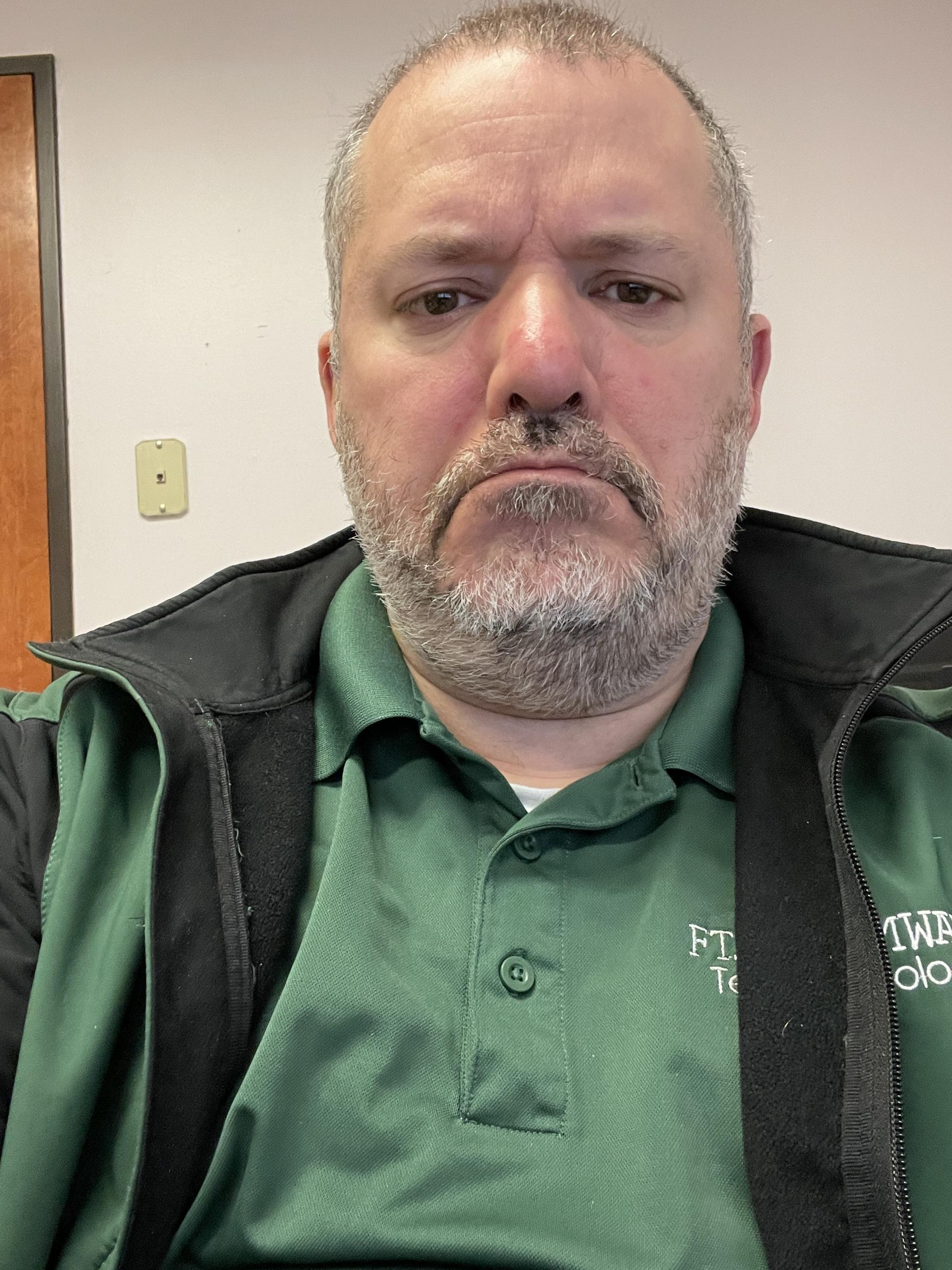 SMS computer tech Craig working over spring break