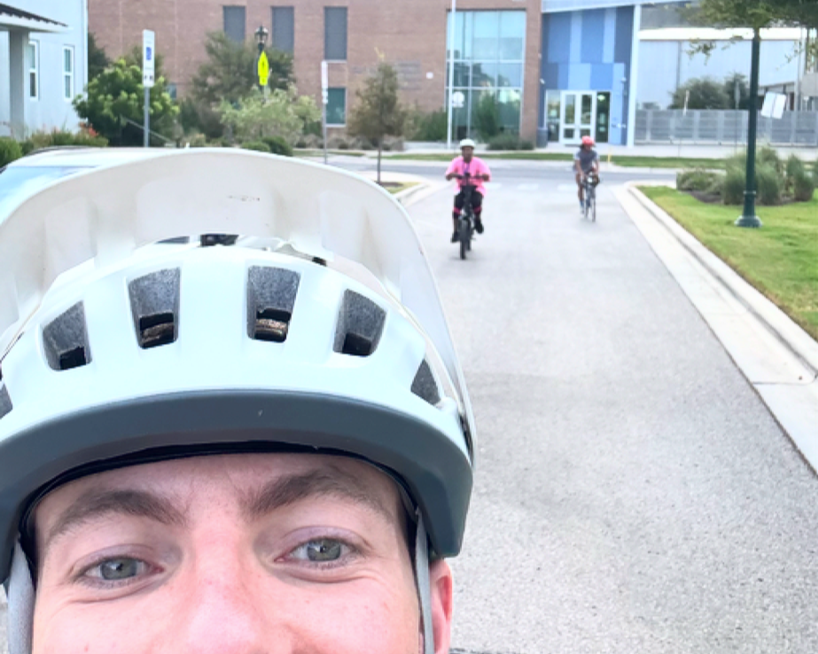 MR. MOORE AND STUDENTS PARTICIPATING IN BIKE BUS
