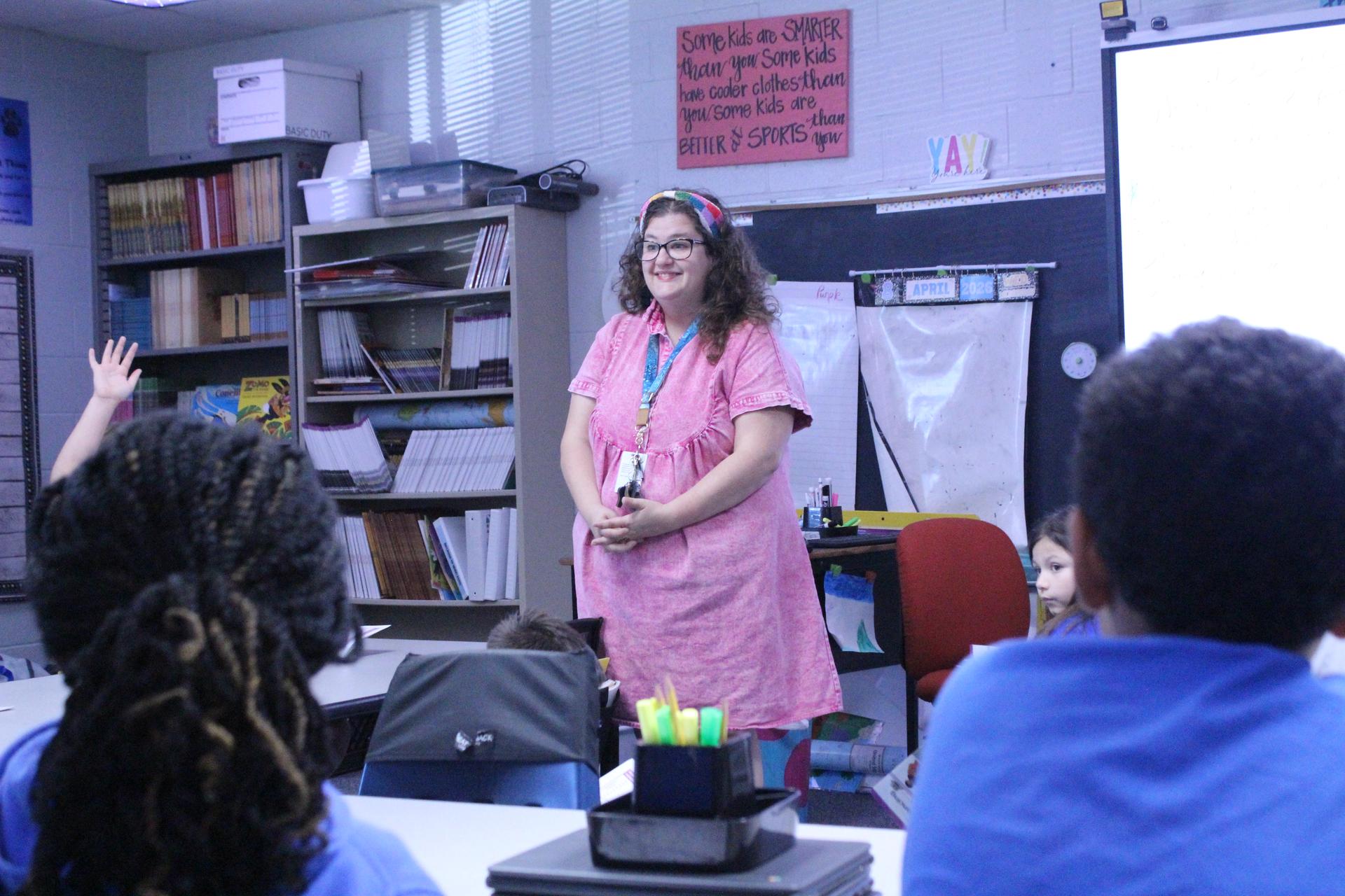 Teacher leading class discussion 