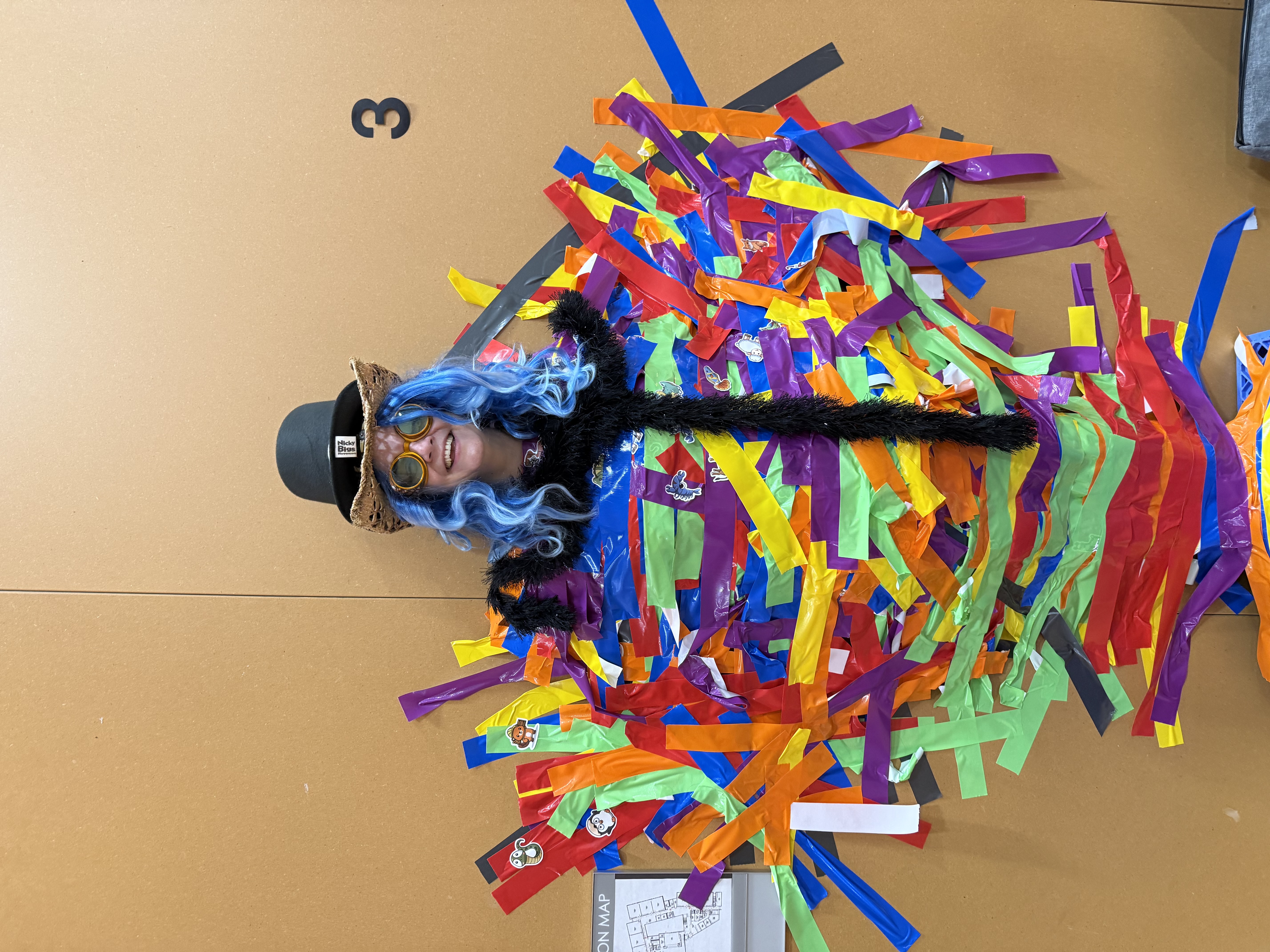 Principal Bull duct taped to the wall.