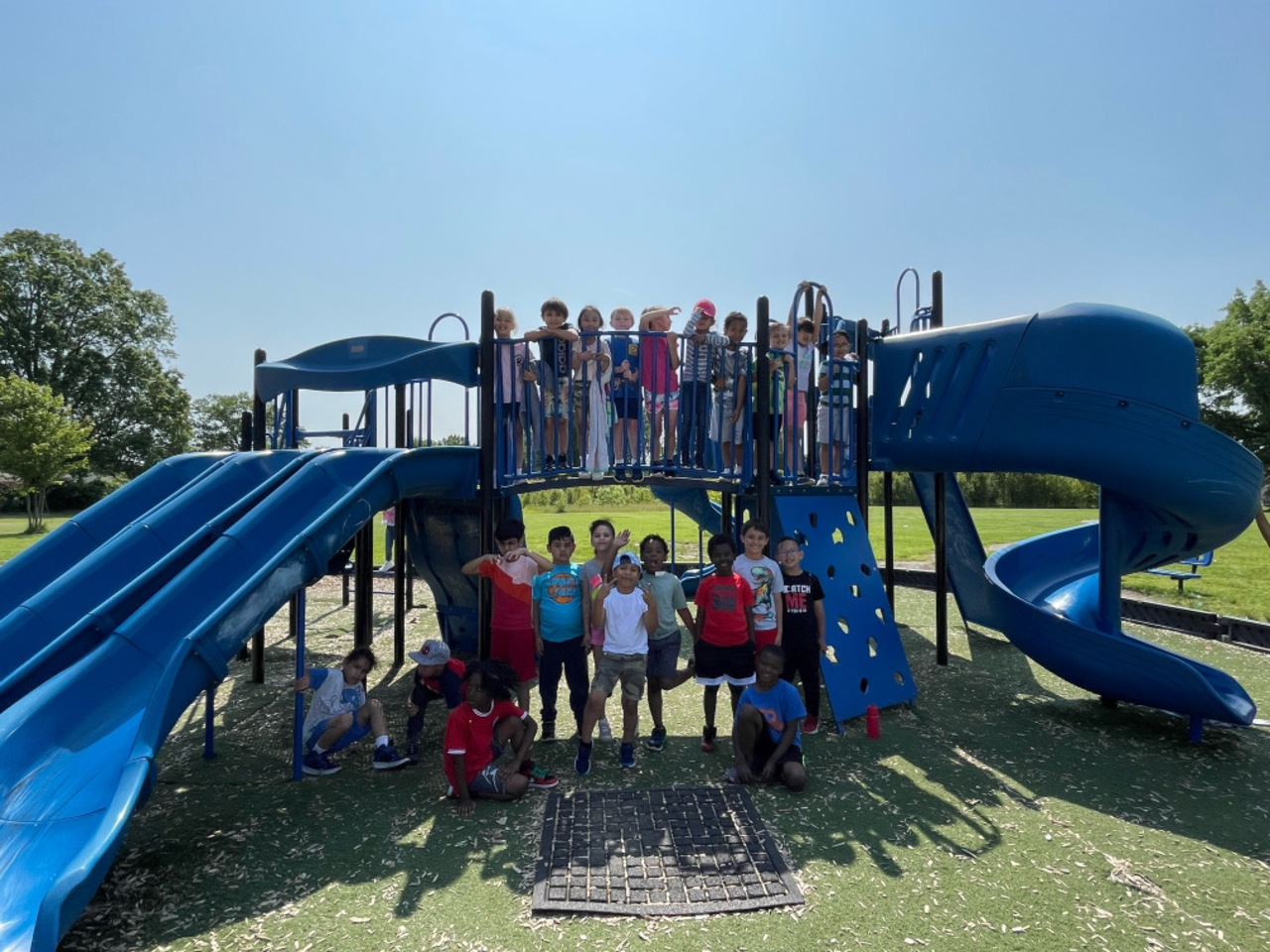 Students posing for picture on the playground.