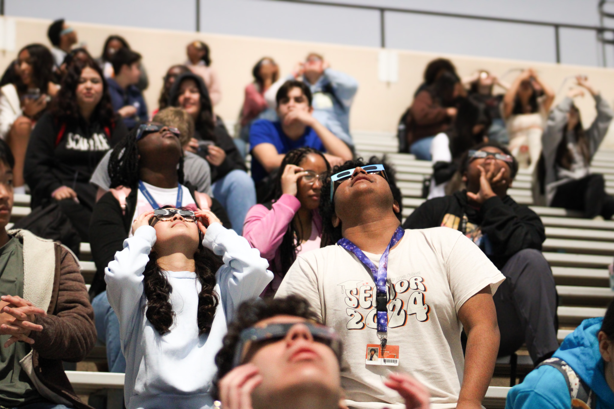 students viewing solar eclipse