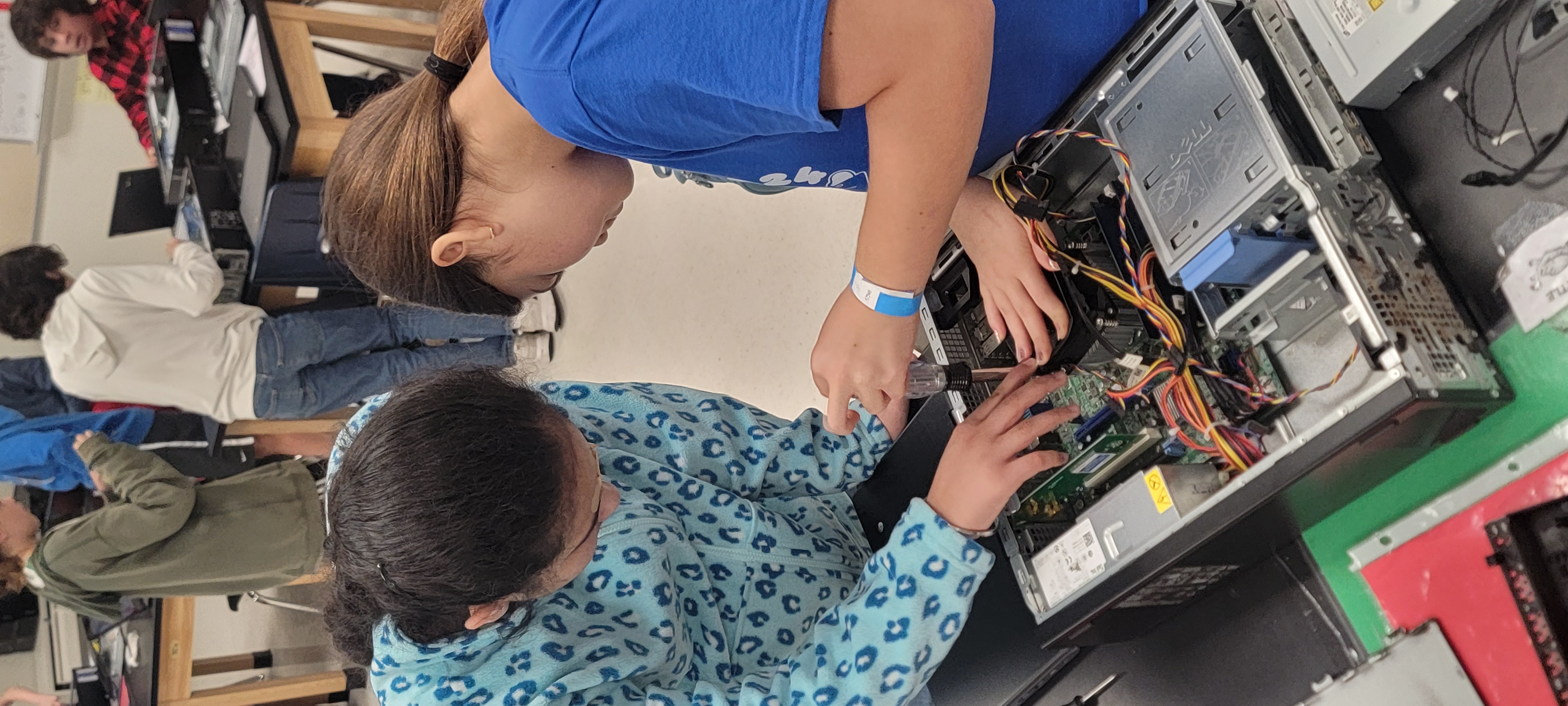 Two students working on a computer