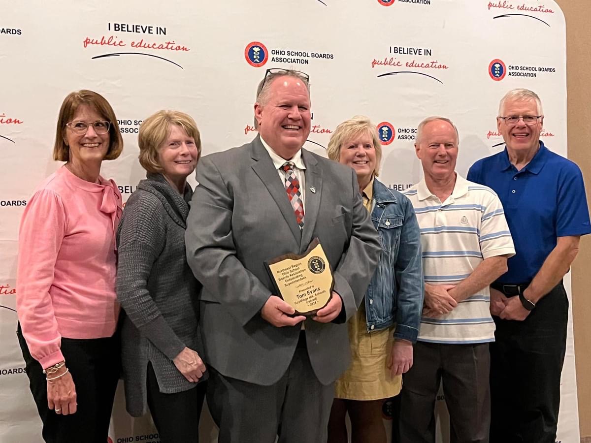 tom evan accepting supt of the year plaque