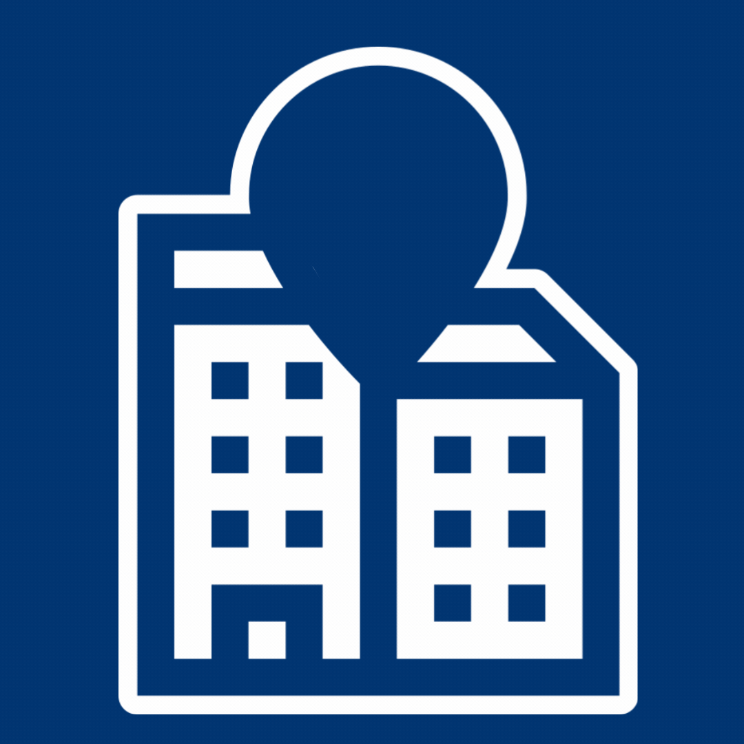 Building with a location sign at the top