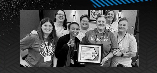 Chris Kunzelman receives Special Olympic award for her work with students.