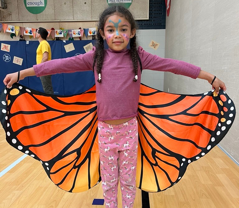 Student with butterfly wings