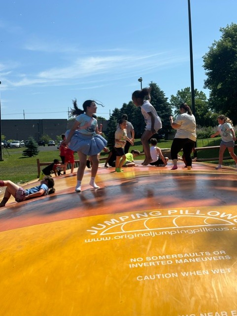 Students on jump pillow