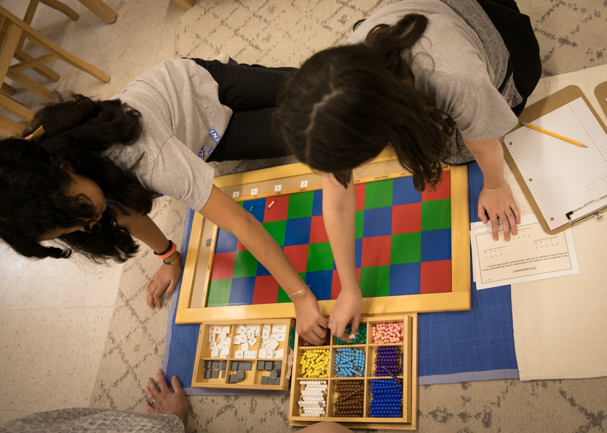 Students use the checkerboard