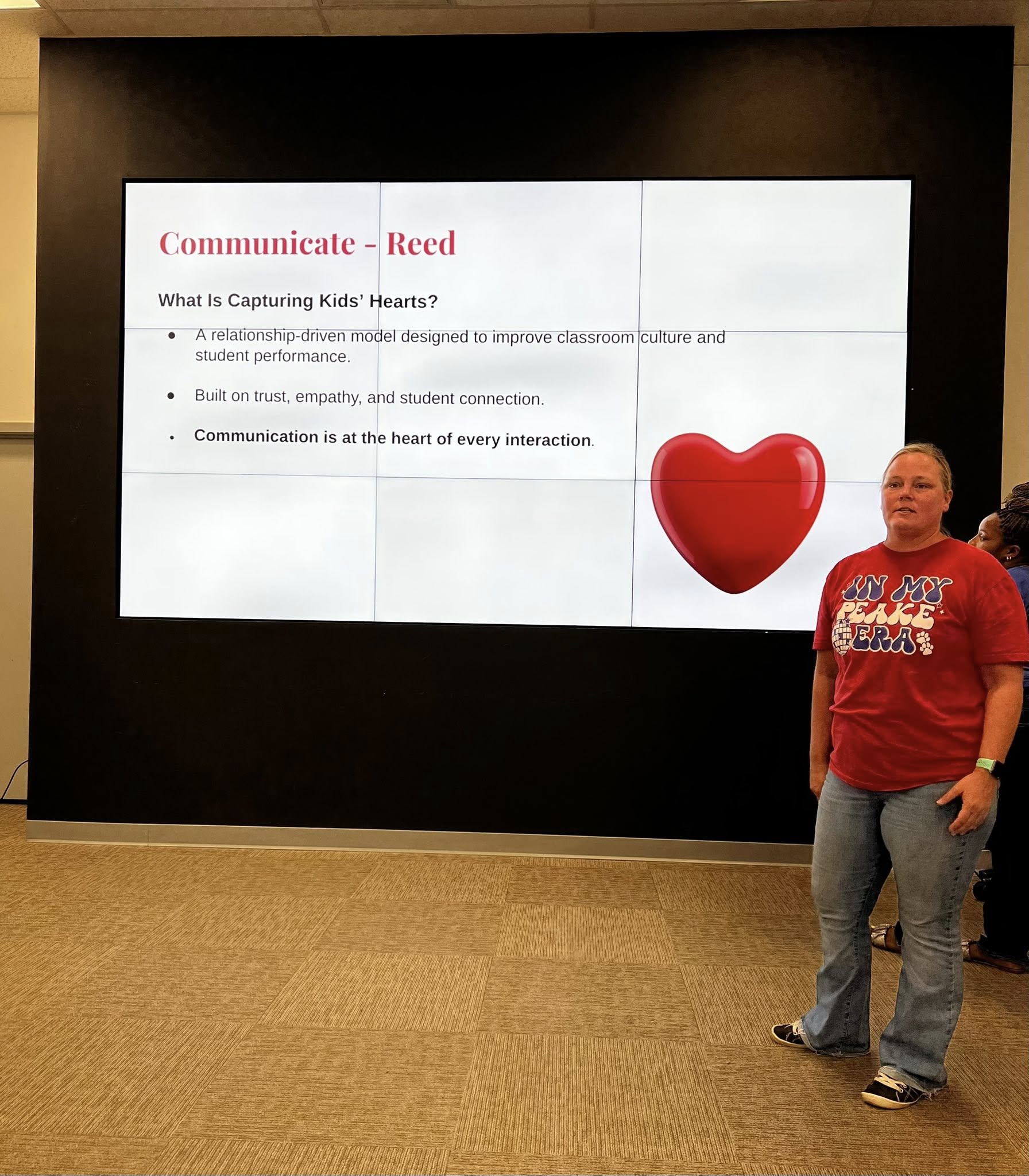 student holding the door open