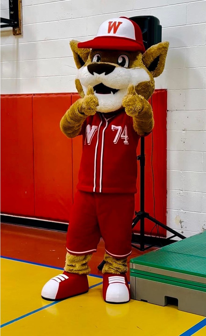 Westwood School Mascot giving a thmbs up