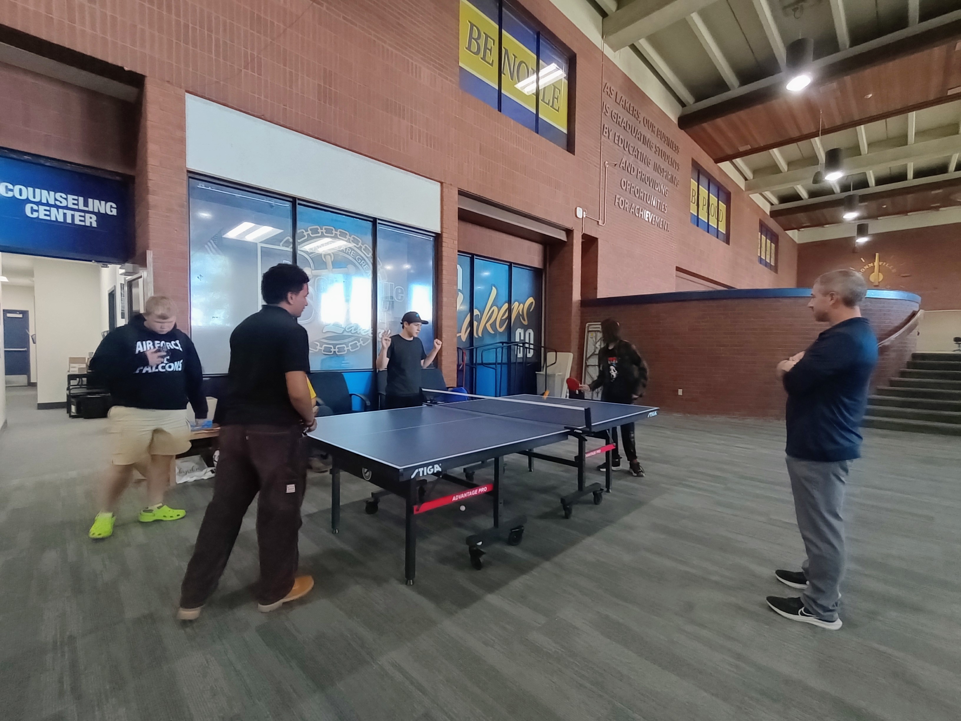 Students playing ping pong