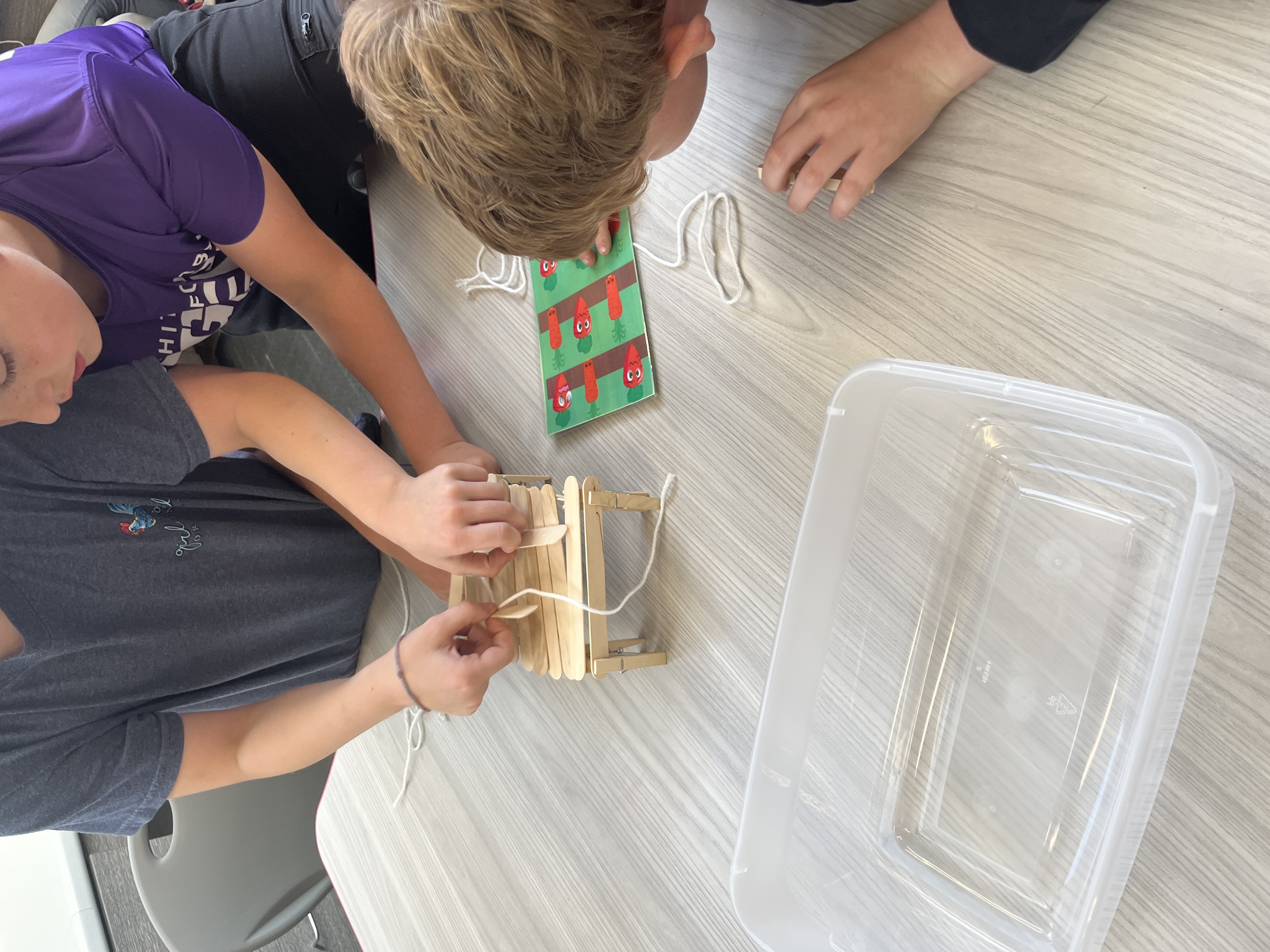 a team working on heir fence