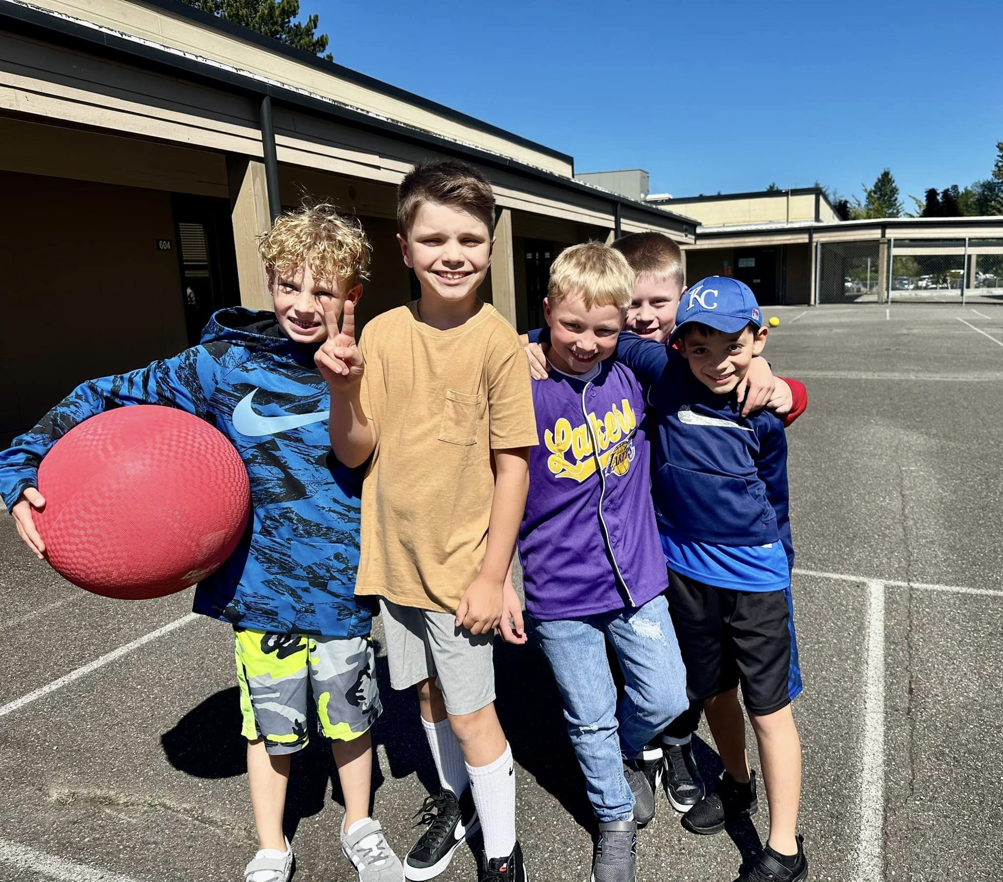 students posing for a photo at recess