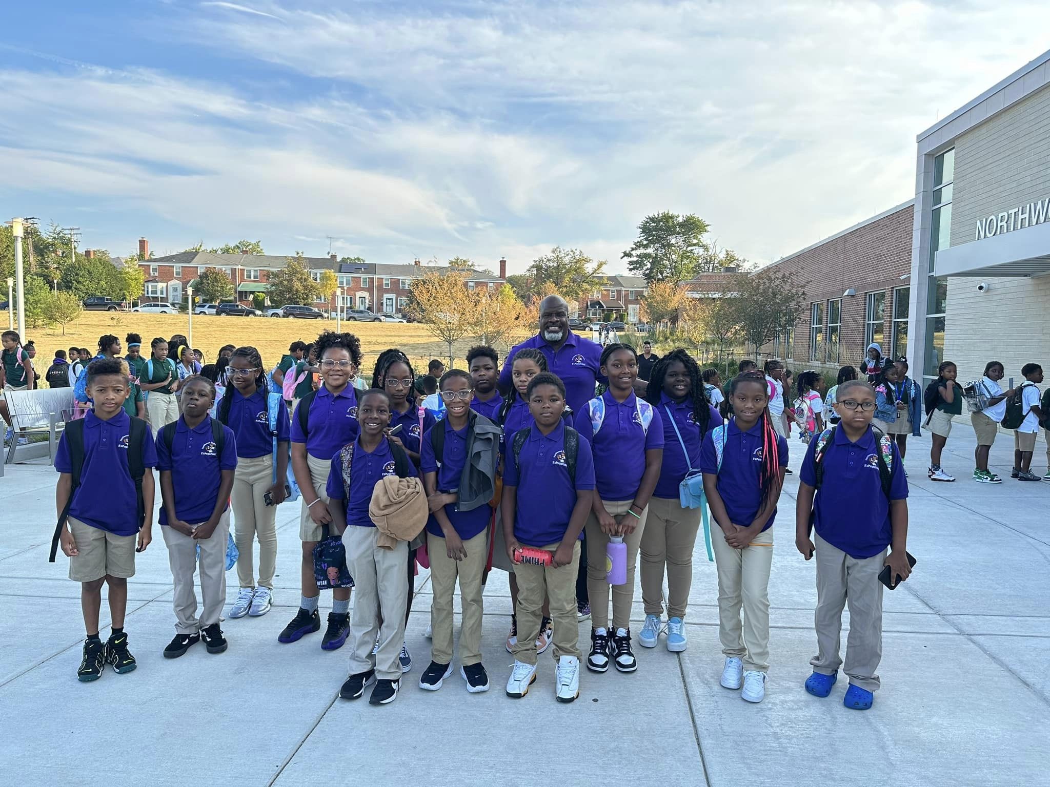 students posing outside 
