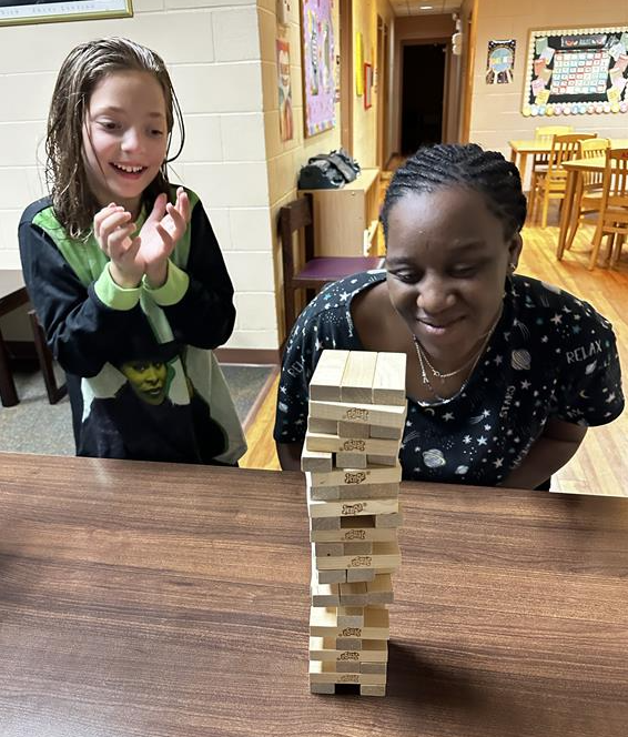 Raelyn and Shanteria play Jenga
