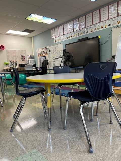 a student table with four chairs