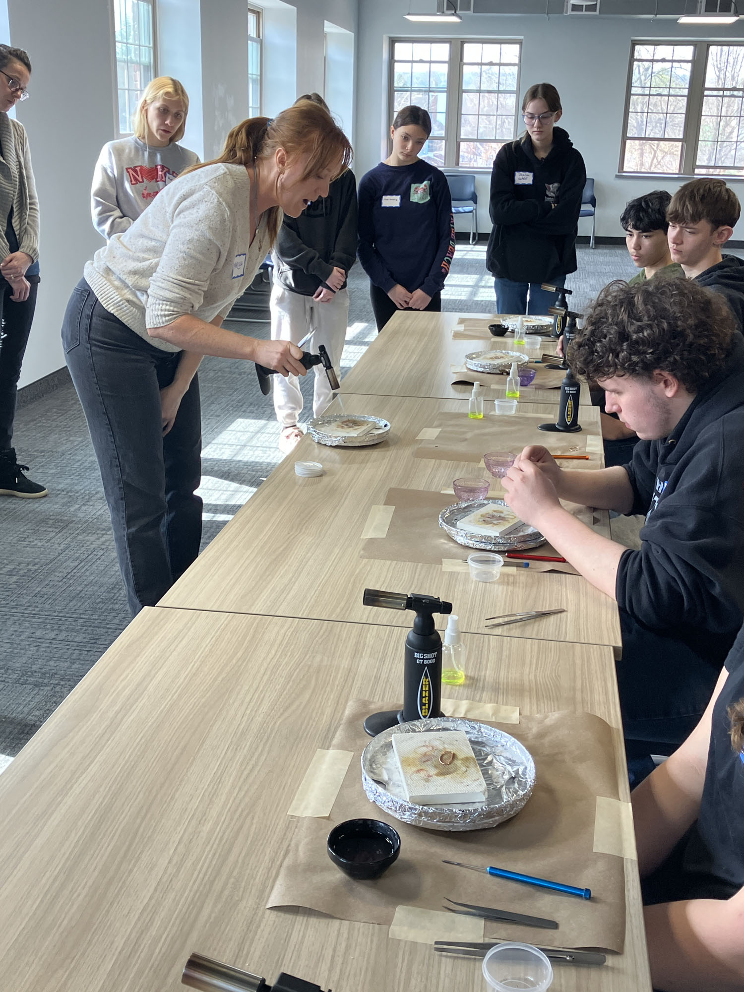 Metalsmithing workshop with students and presenter