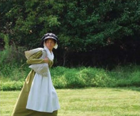 woman portraying running on the underground railroad