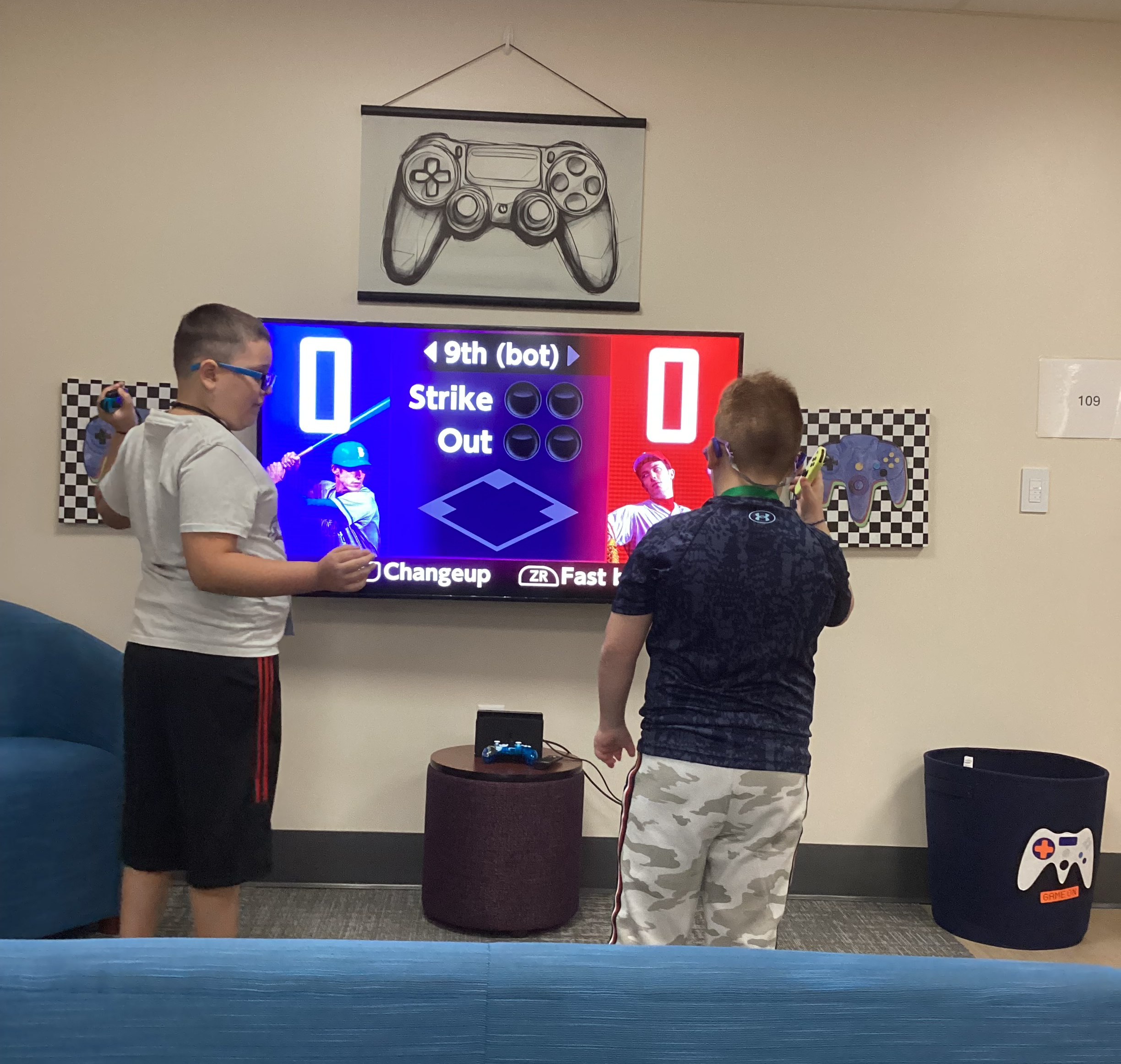 Lucas and Wilder play video game baseball