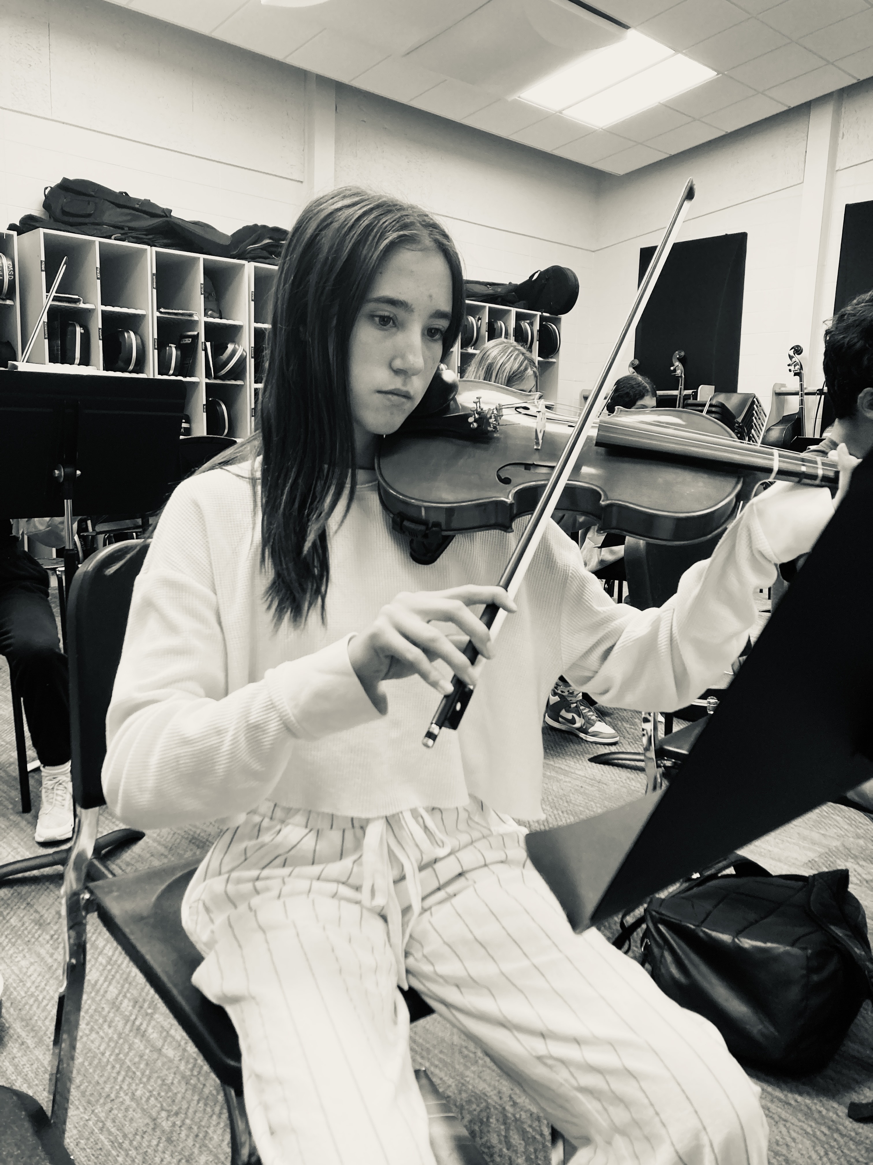 Student playing violin