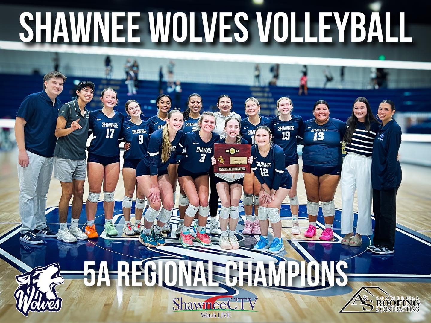 Volleyball team holding award