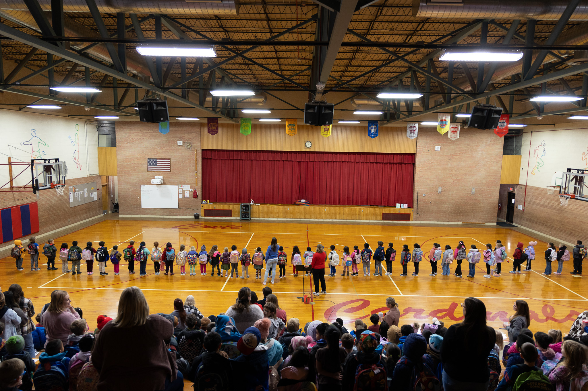 CES Staff and Students say the pledge together in the gym at one of their Friday morning Spirit Rallies.