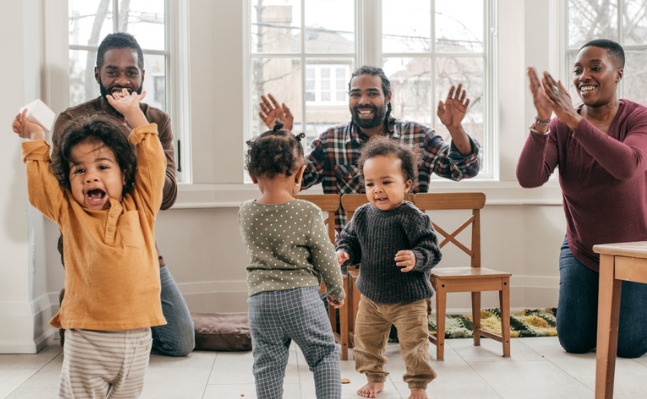 parents playing with toddlers