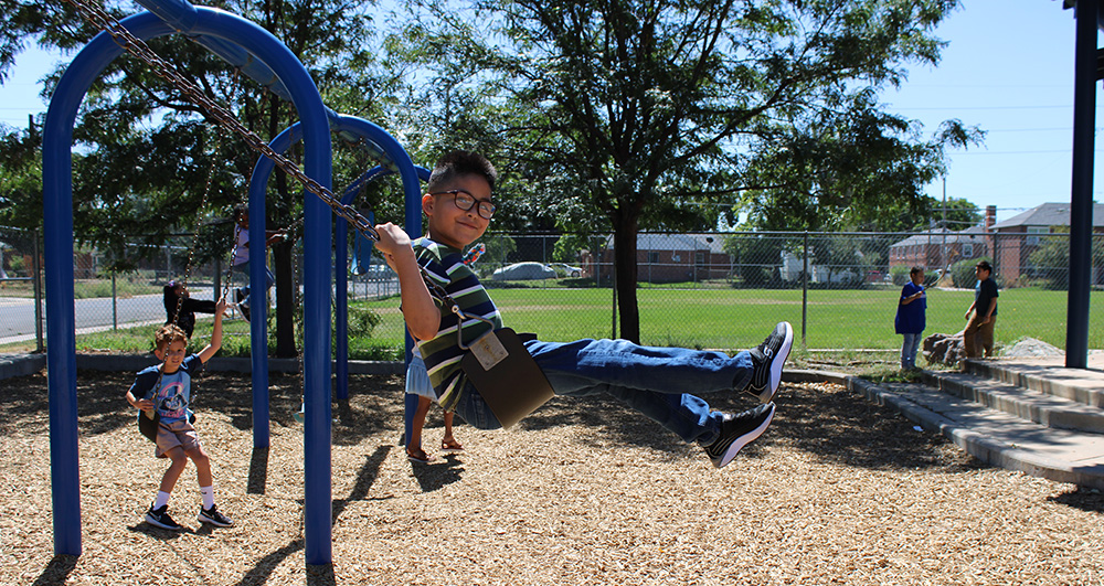 boy swinging on a swing