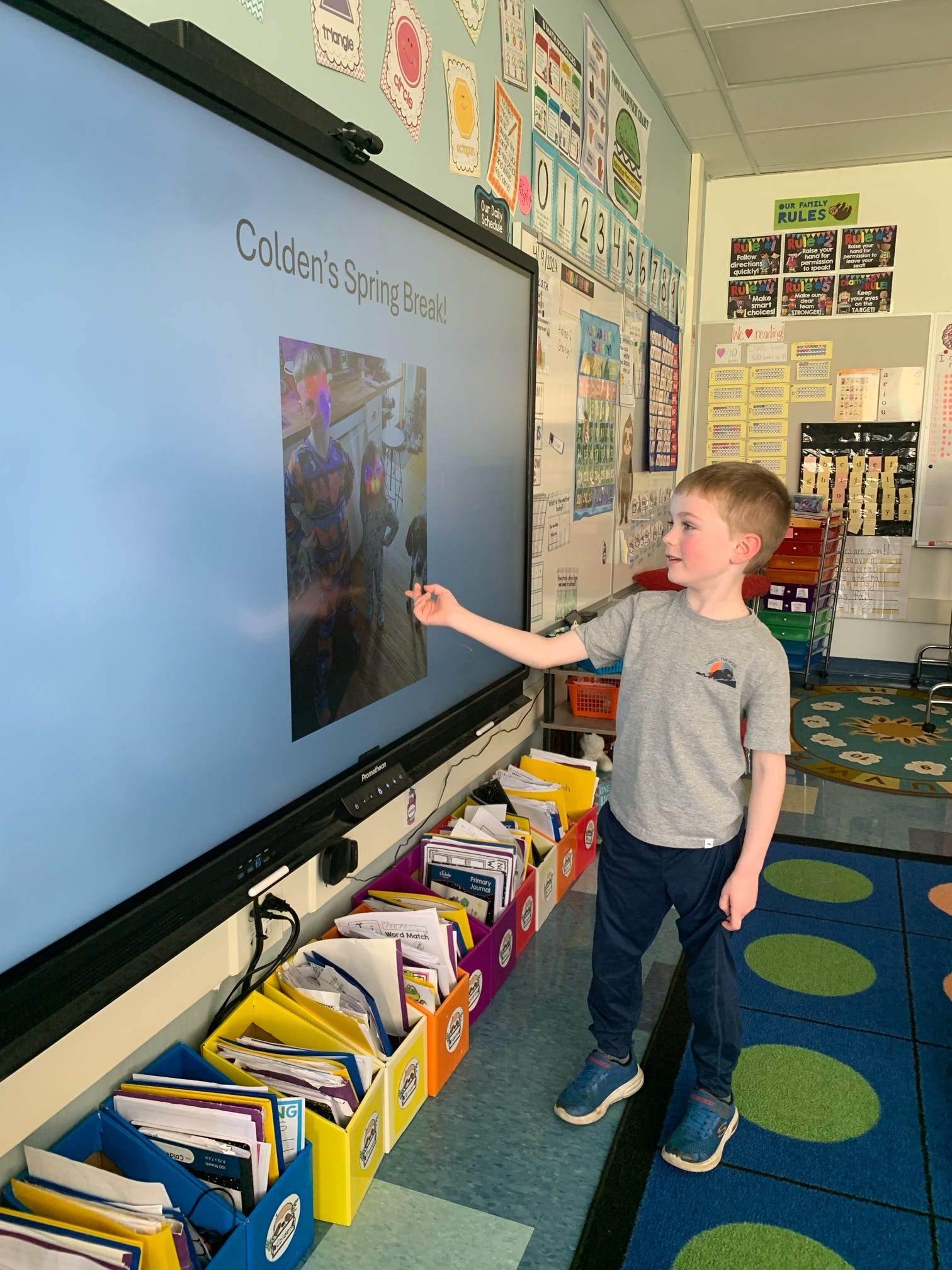 student at the smartboard